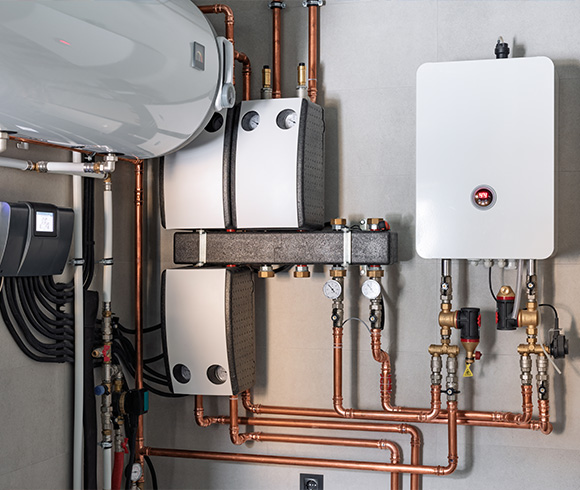 modern heating system with copper pipes and boilers including 12 energy efficient components